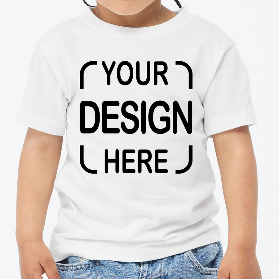 A child wearing a white short-sleeve T-shirt with black placeholder text reading 'YOUR DESIGN HERE' on the front