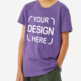 A child wearing a heather purple short-sleeve t-shirt with white placeholder text reading 'YOUR DESIGN HERE' on the front