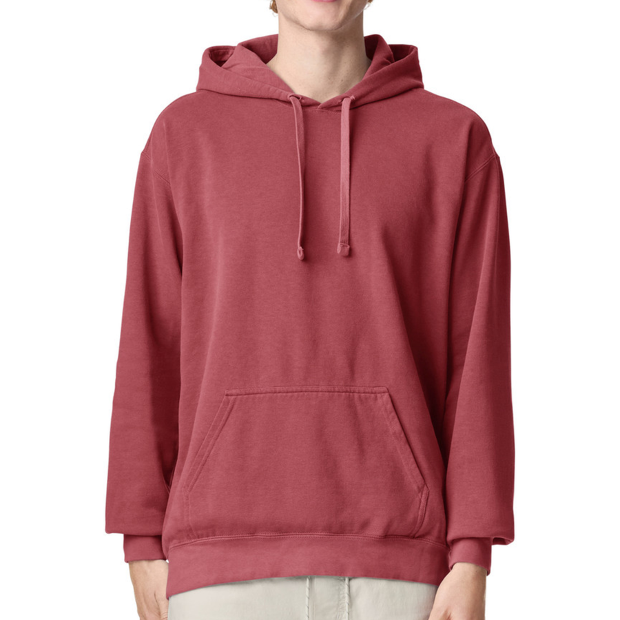 A person wearing a dusty rose red pullover hoodie with matching drawstrings and a front kangaroo pocket,
