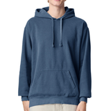 A person wearing a plain blue pullover hoodie with drawstrings and a front kangaroo pocket