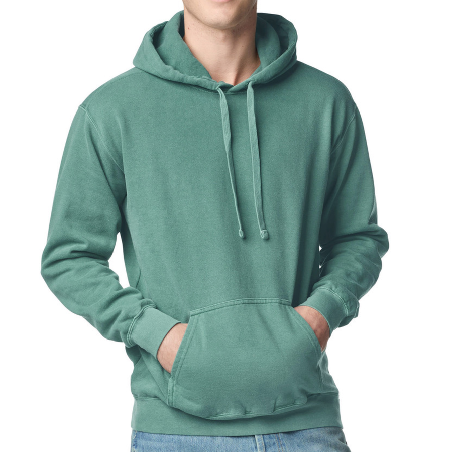 A person wearing a muted sage green pullover hoodie with drawstrings and a front kangaroo pocket