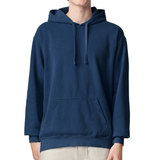 A person wearing a navy blue pullover hoodie with drawstrings and a front kangaroo pocket