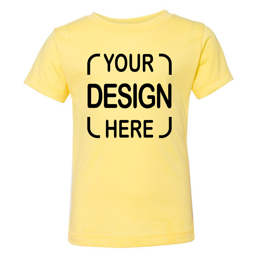 A pale yellow short-sleeve t-shirt with black placeholder text reading 'YOUR DESIGN HERE' printed on the front
