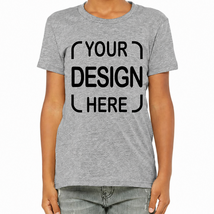 A person wearing a heather gray short-sleeve T-shirt with black placeholder text reading 'YOUR DESIGN HERE' on the front