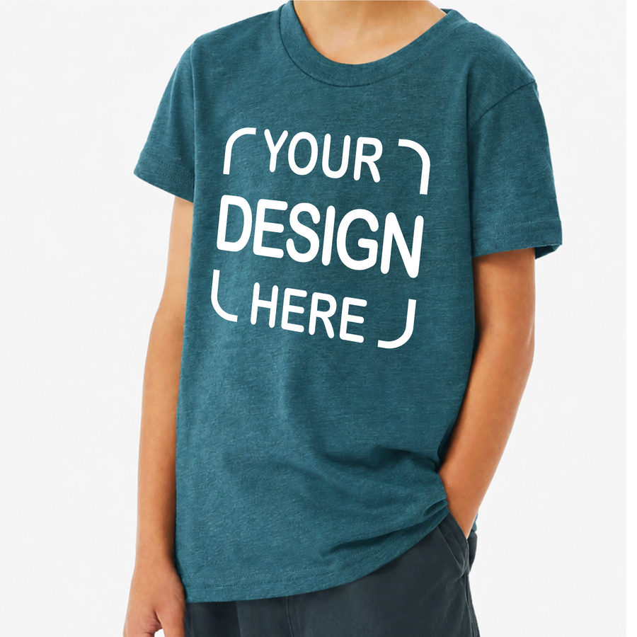 A person wearing a heathered teal blue short-sleeve t-shirt with white placeholder text reading 'YOUR DESIGN HERE' on the front,