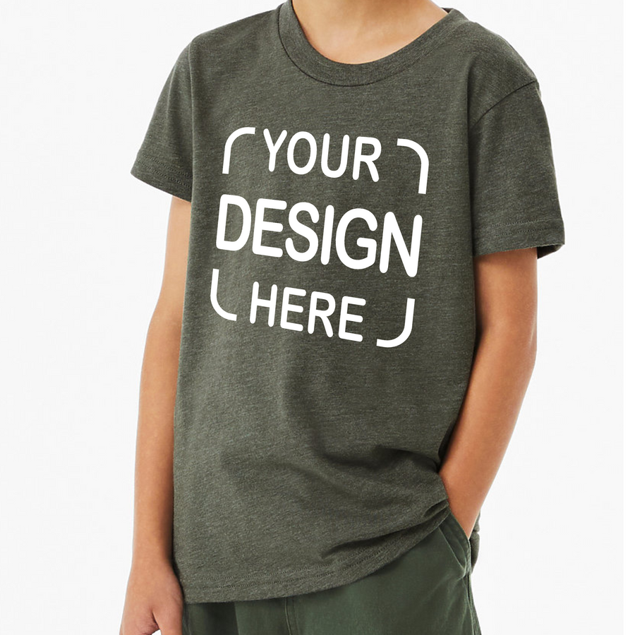 A person wearing a dark heather gray t-shirt with white placeholder text reading 'YOUR DESIGN HERE' on the front