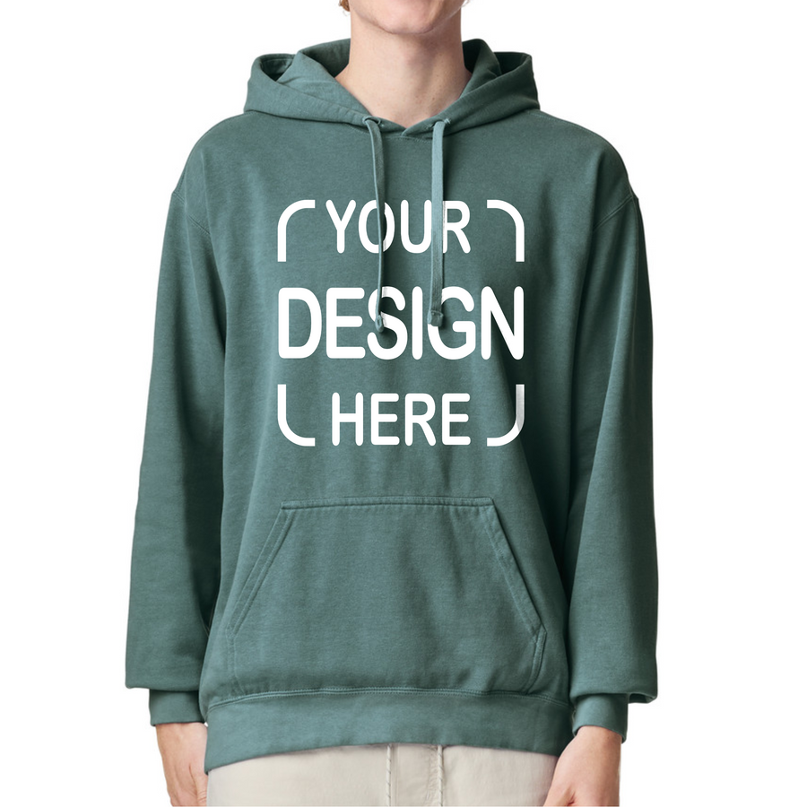 A person wearing a muted green pullover hoodie with a white customizable graphic print reading 'YOUR DESIGN HERE' on the front